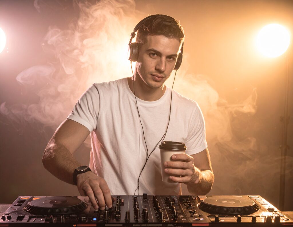 Firefly Make A Photo Of A Dj Mixing With A Coffee Cup In His Hands 36571 1024x796